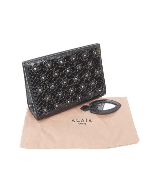 Cover in black python ALAIA with its mirror