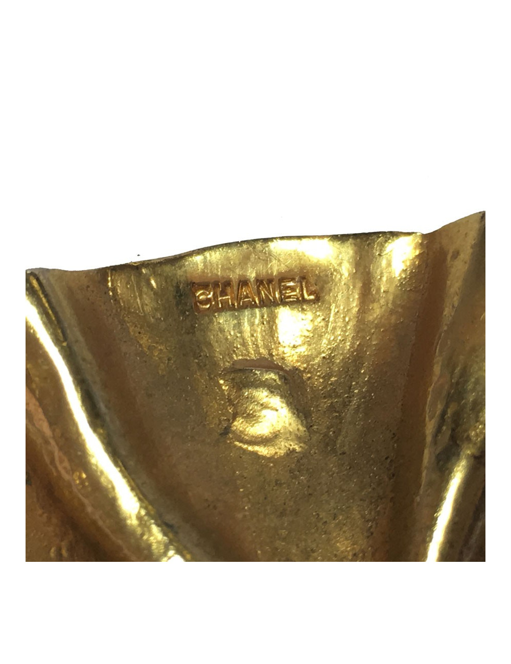 Broche CHANEL Vintage ronde en laiton doré