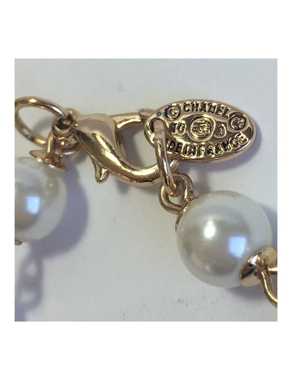 Sautoir CHANEL perles et doré