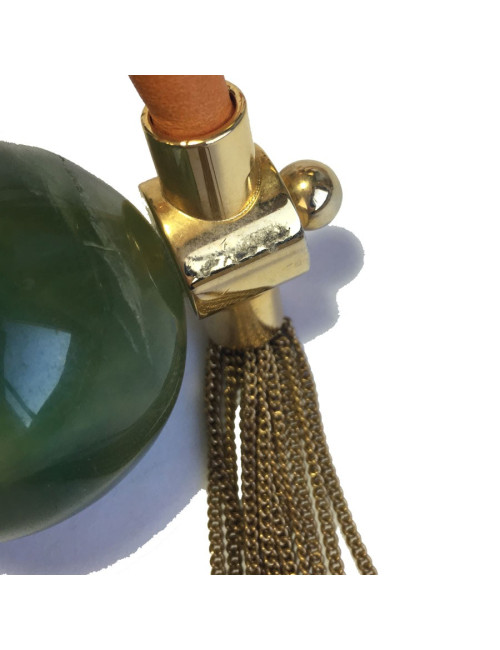 Orange leather, gold metal and green stone pendant necklace