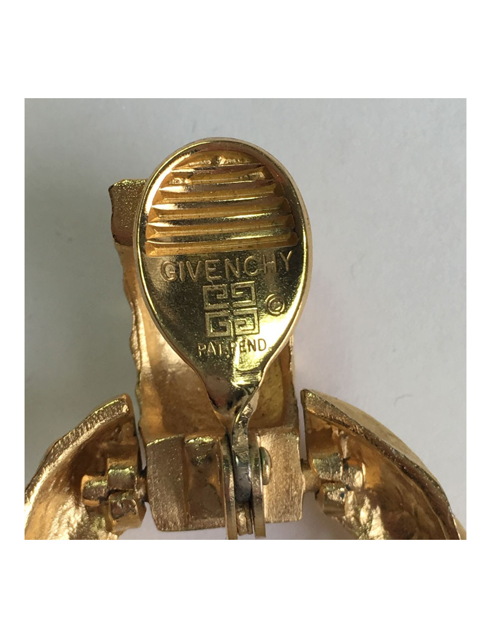 GIVENCHY clip-on earrings in matte gilded metal