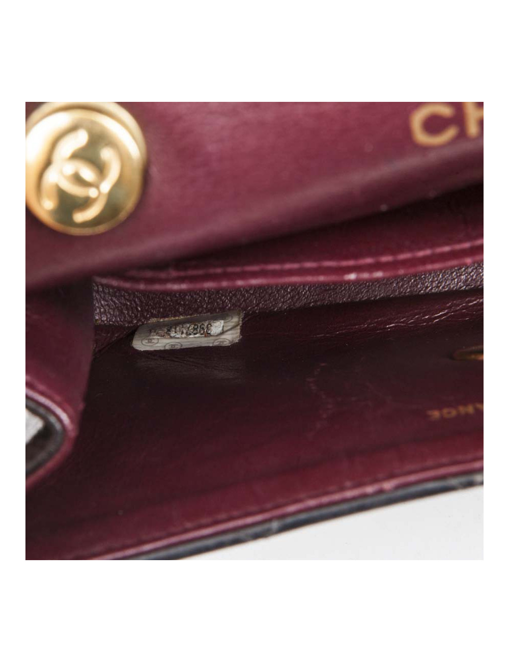 Mini sac CHANEL cuir d'agneau lisse matelassé noir