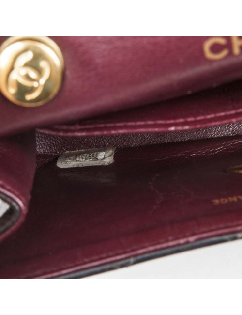 Mini black quilted smooth lambskin CHANEL bag