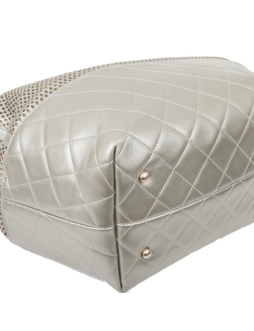 CHANEL quilted and perforated leather bag