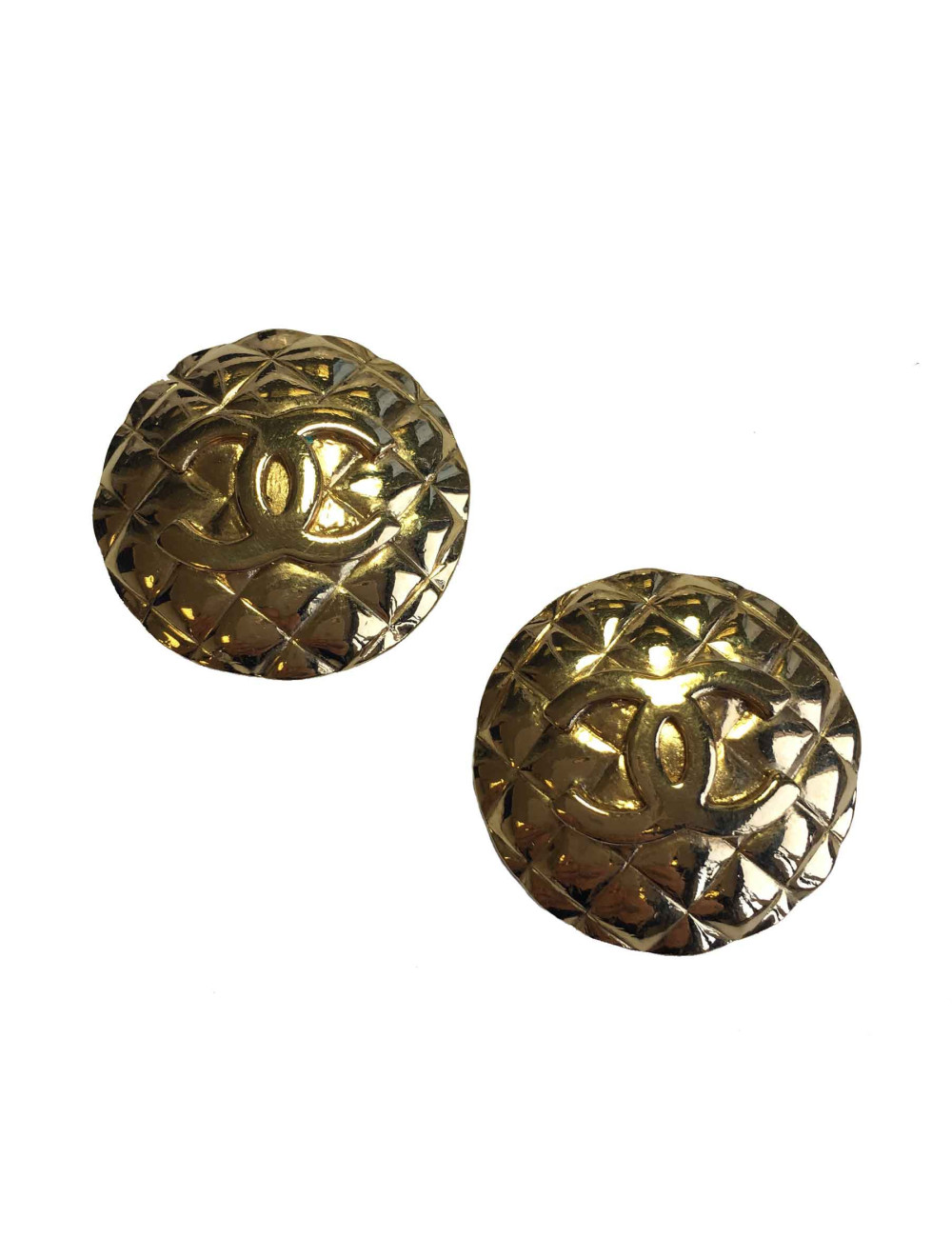 Boucles d'oreille clips CHANEL rondes en métal doré matelassé