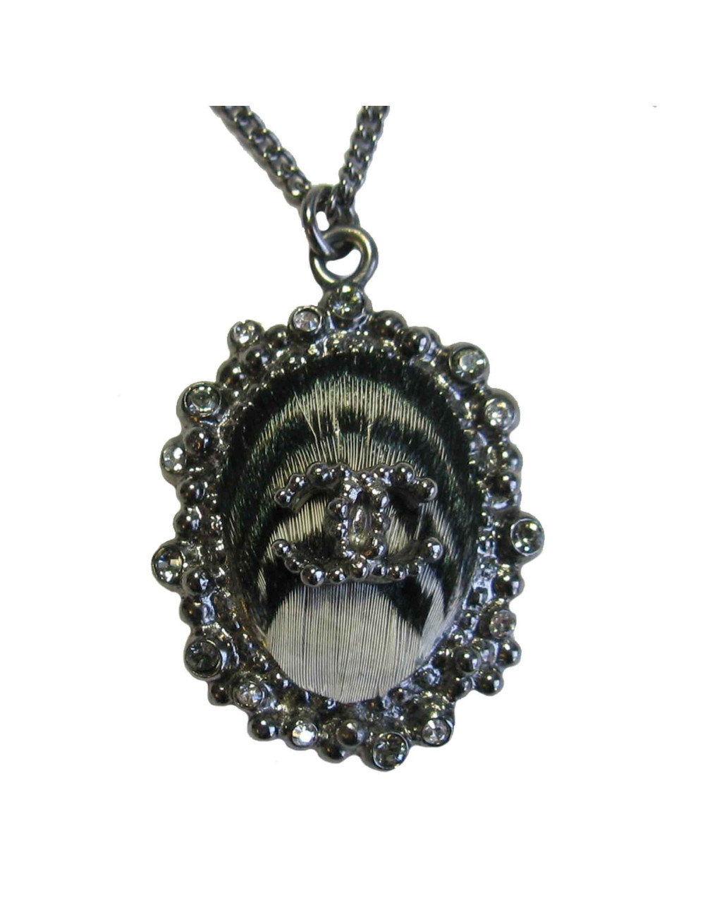 Collier CHANEL en métal argenté et plume