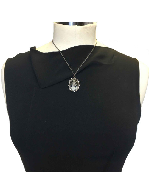 CHANEL pendant necklace in silver plated metal and feather