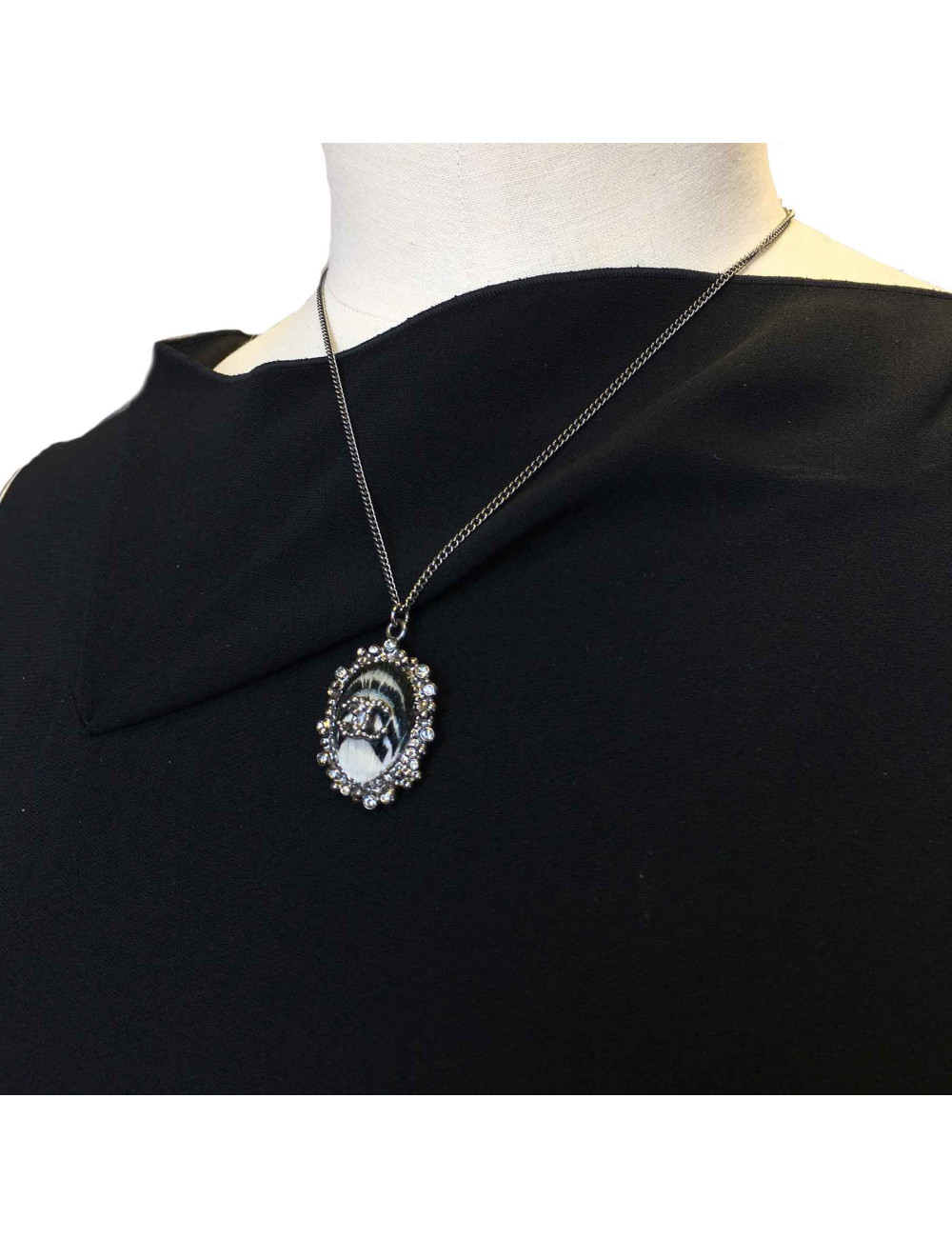 CHANEL pendant necklace in silver plated metal and feather