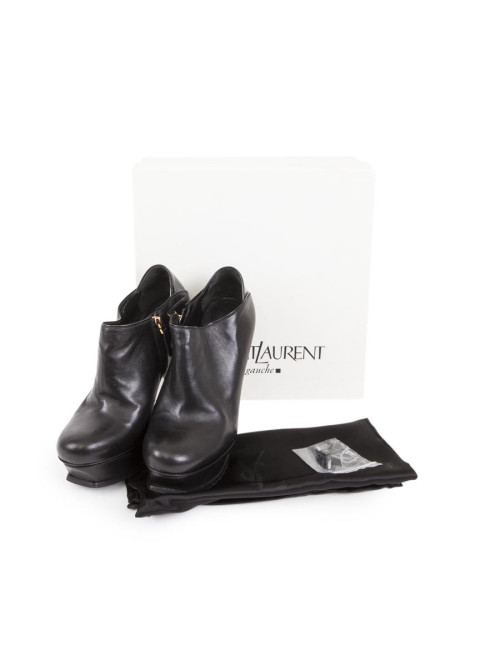 Boots YVES SAINT LAURENT comprensées T37 cuir noir