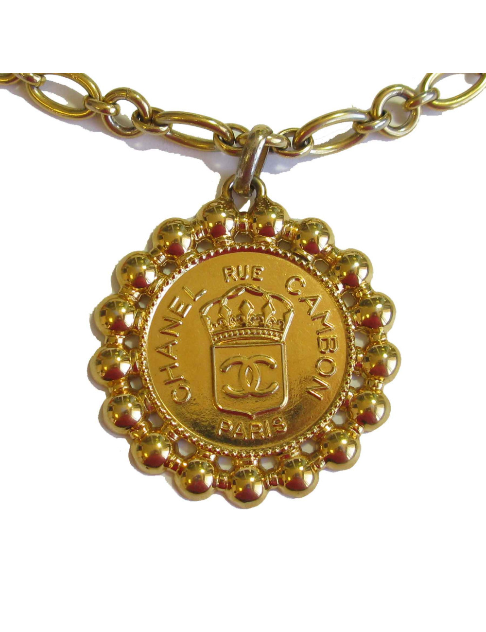 Sautoir Médaillon CHANEL vintage en métal doré