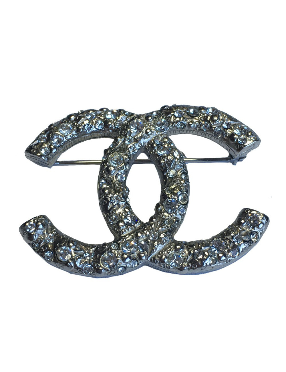 Broche CHANEL CC en métal argenté serti de strass