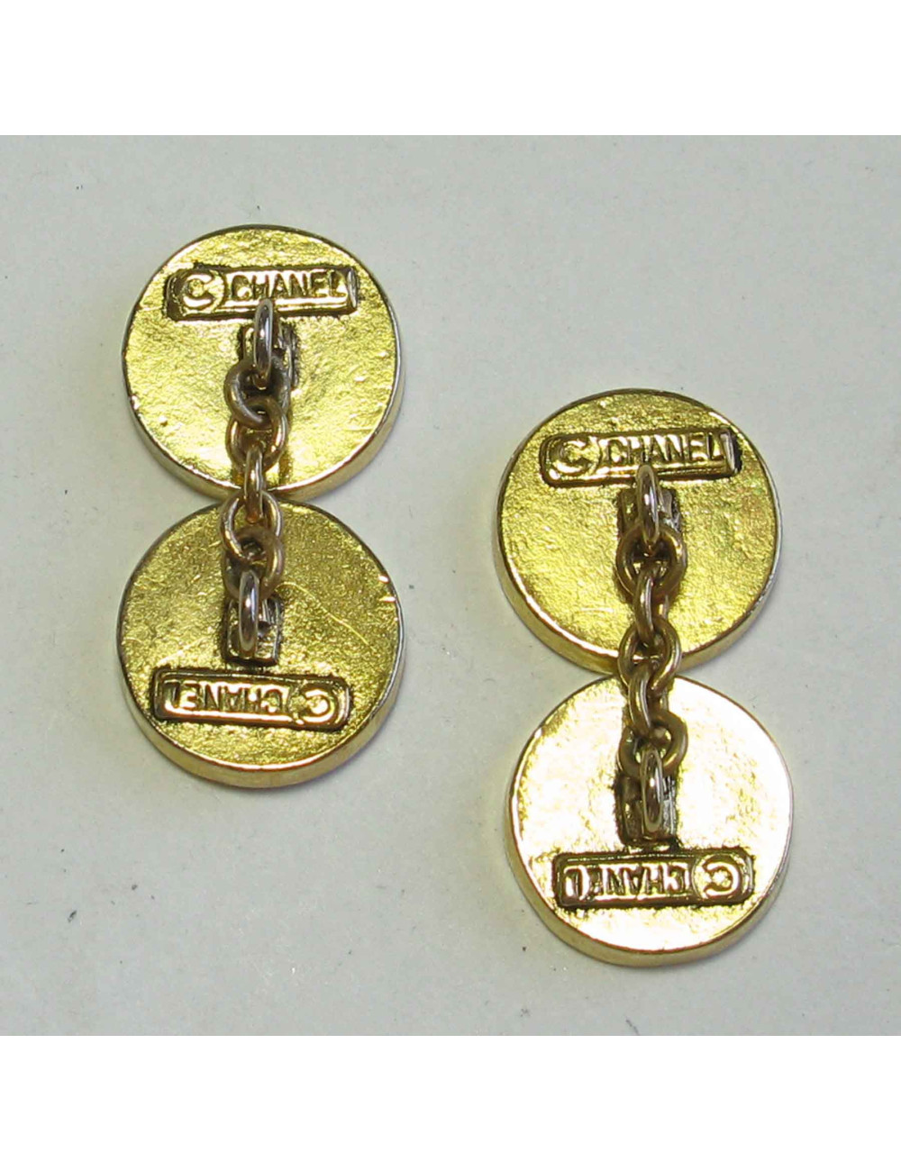 Boutons de manchette CHANEL en métal doré