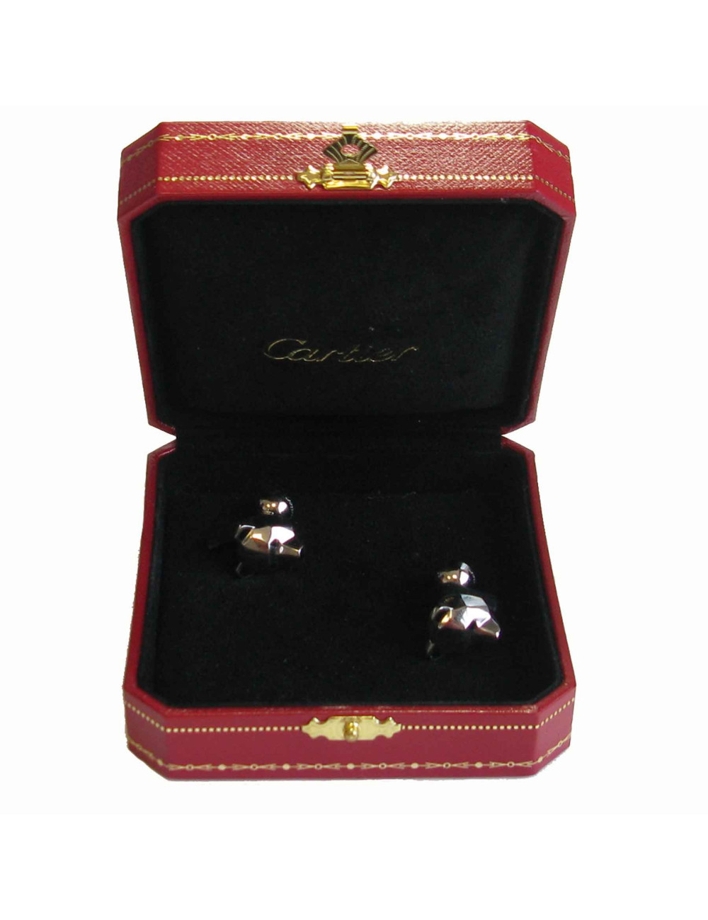 Boutons de manchette CARTIER 'tête d'ours' en argent massif