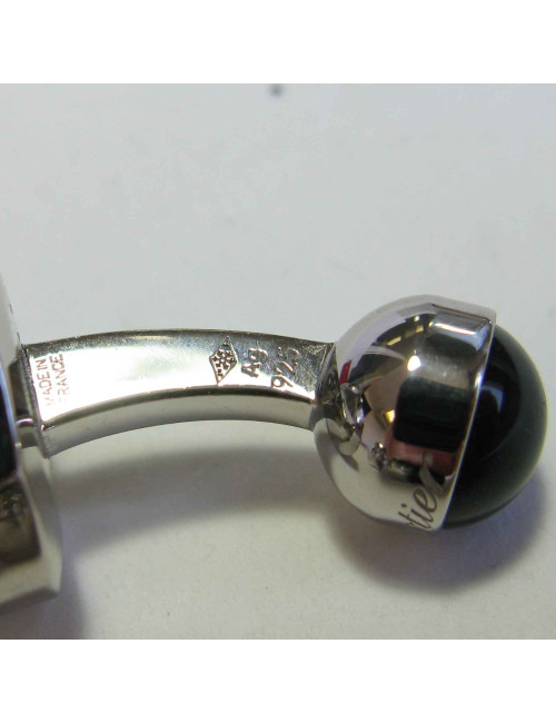 Boutons de manchette CARTIER 'tête d'ours' en argent massif