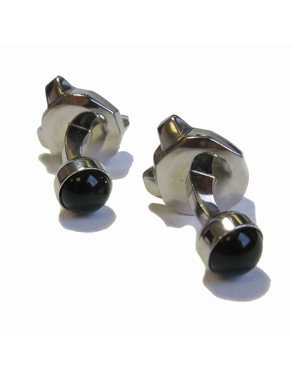 Boutons de manchette CARTIER 'tête d'ours' en argent massif