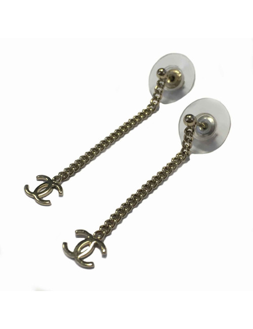 Boucles d'oreille clous CHANEL pendantes en métal doré