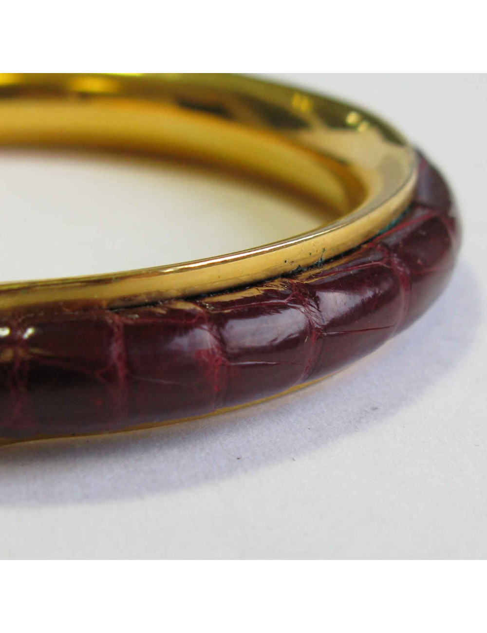 xxx Bracelet HERMES  plaqué or et croco rouge H Vintage