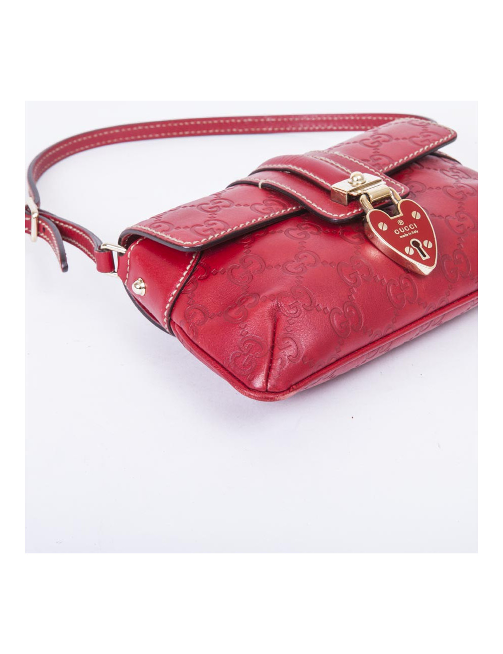 Petit sac GUCCI cuir embosé "GG" rouge