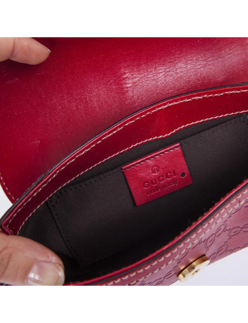 Petit sac GUCCI cuir embosé "GG" rouge