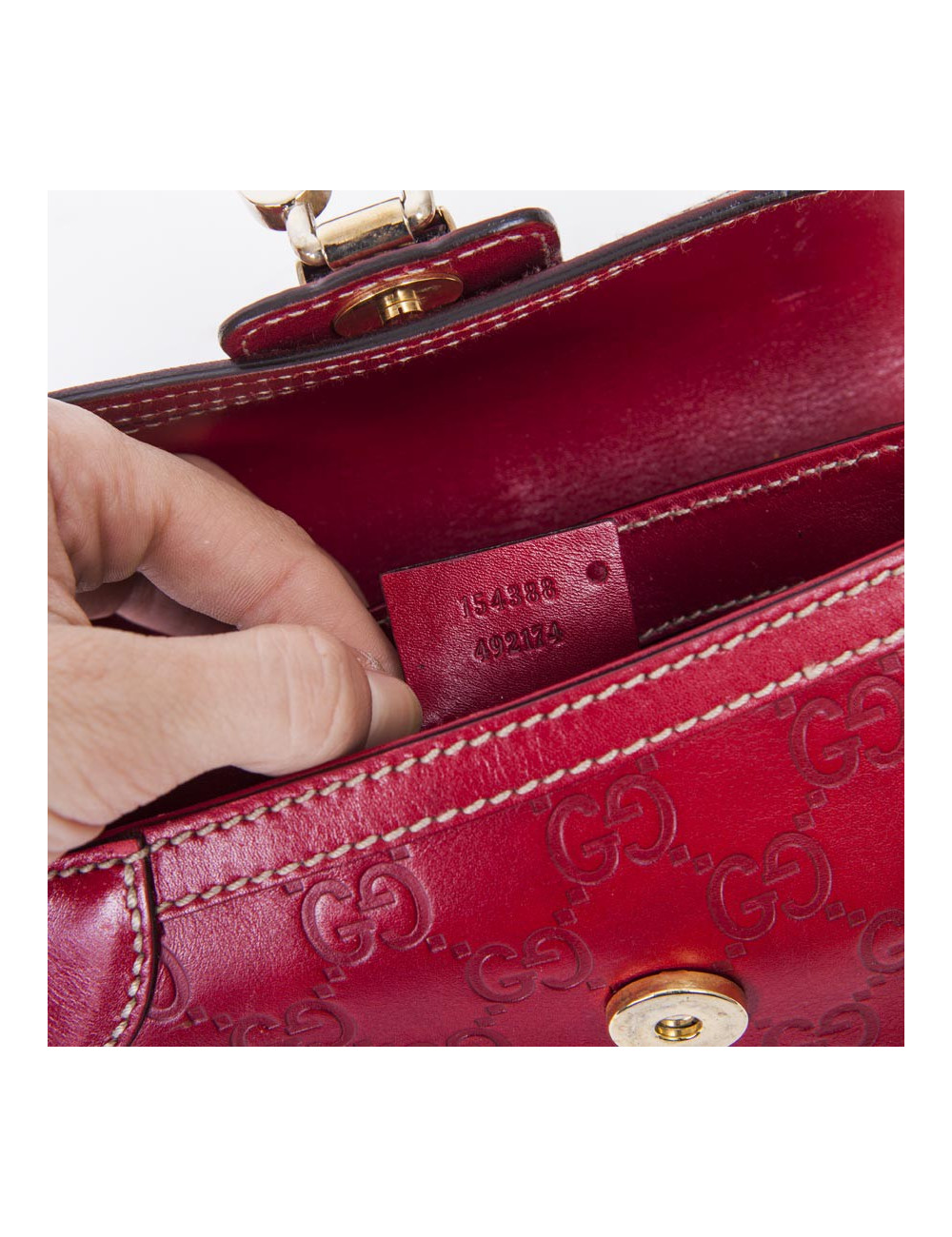 Petit sac GUCCI cuir embosé "GG" rouge