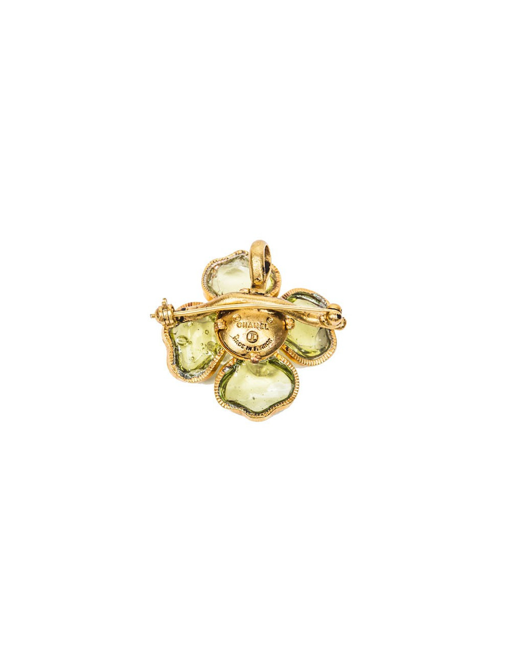 CHANEL camélia brooch in gilded metal and green molten glass
