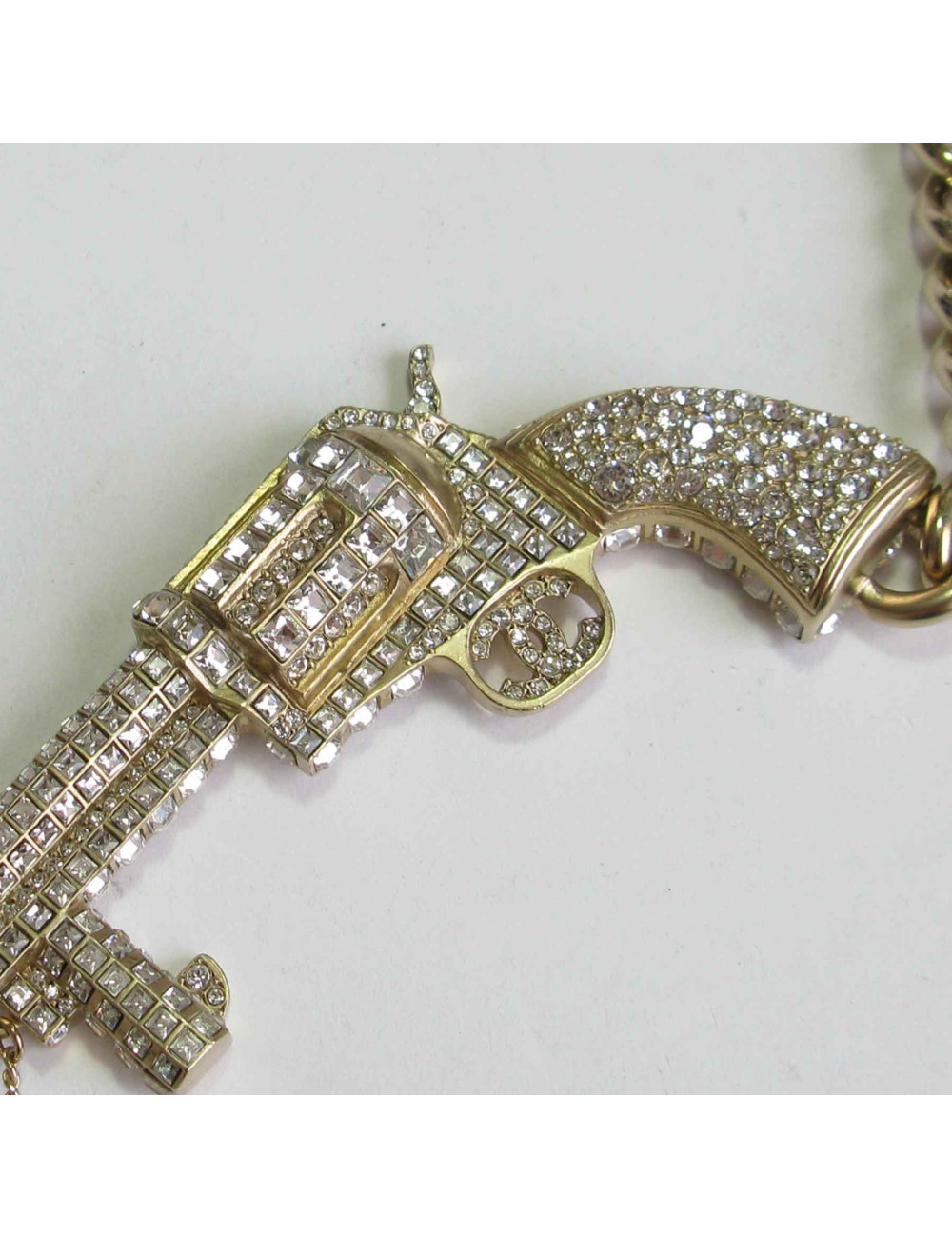 Ceinture revolver CHANEL en métal doré, strass et pâte de verre