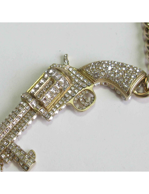 Ceinture revolver CHANEL en métal doré, strass et pâte de verre