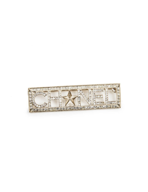 Broche "Paris-Dallas" avec strass