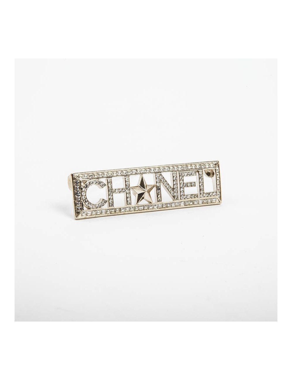 Broche "Paris-Dallas" avec strass
