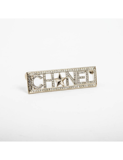 Broche "Paris-Dallas" avec strass