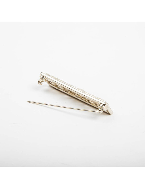 Broche "Paris-Dallas" avec strass