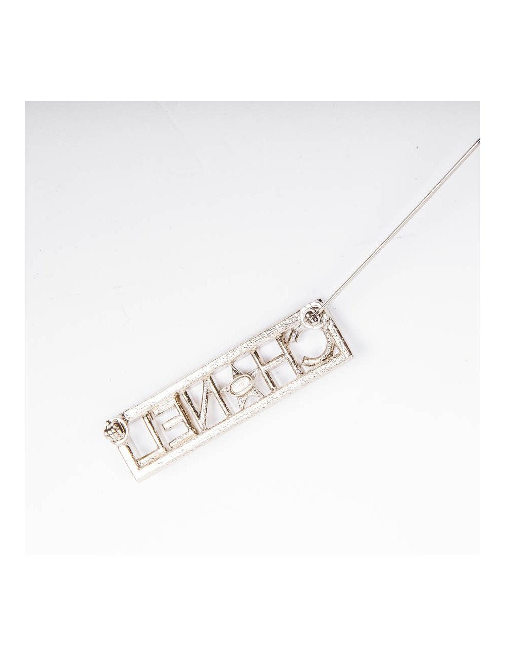 Broche "Paris-Dallas" dorée