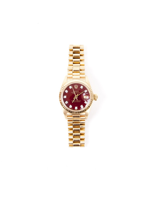 Montre ROLEX pour femme or jaune et diamants