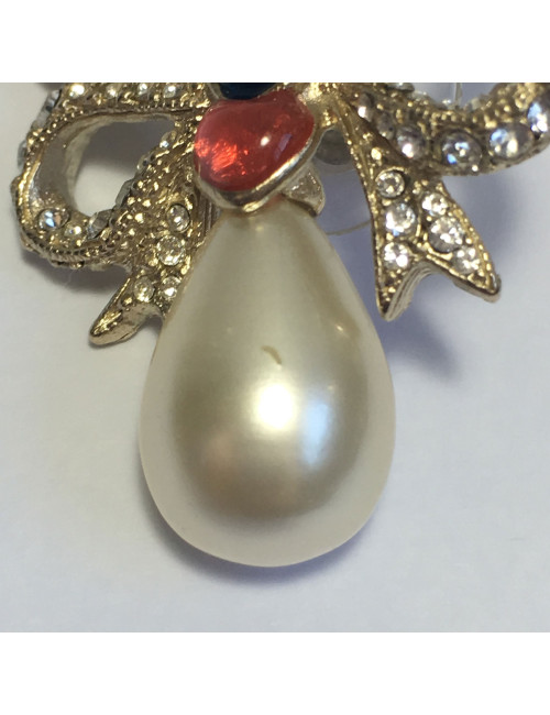 Boucles d'oreille clous CHANEL Noeuds et perle ovale nacrée