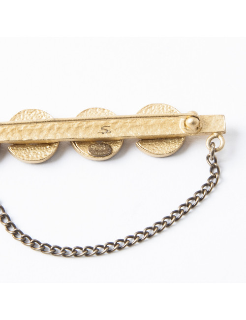  CHANEL 'COCO' brooch in matt gilded metal and black rhinestones