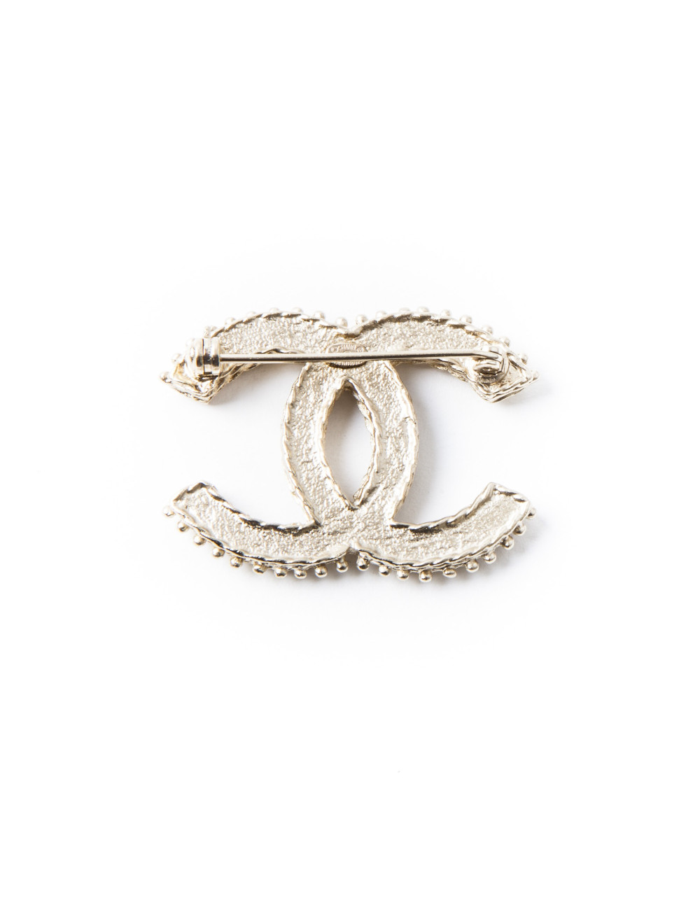 Broche dorée CHANEL double C sertie de brillants