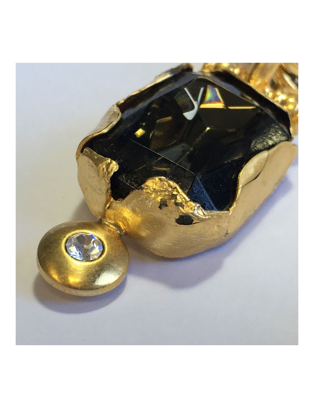 GIANFRANCO FERRE Vintage clip-on earrings in gilded metal, faceted stone and brilliant