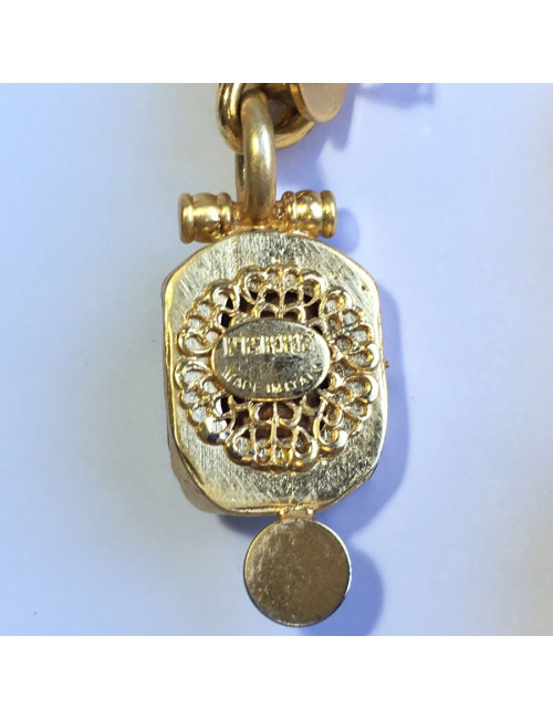 GIANFRANCO FERRE Vintage clip-on earrings in gilded metal, faceted stone and brilliant