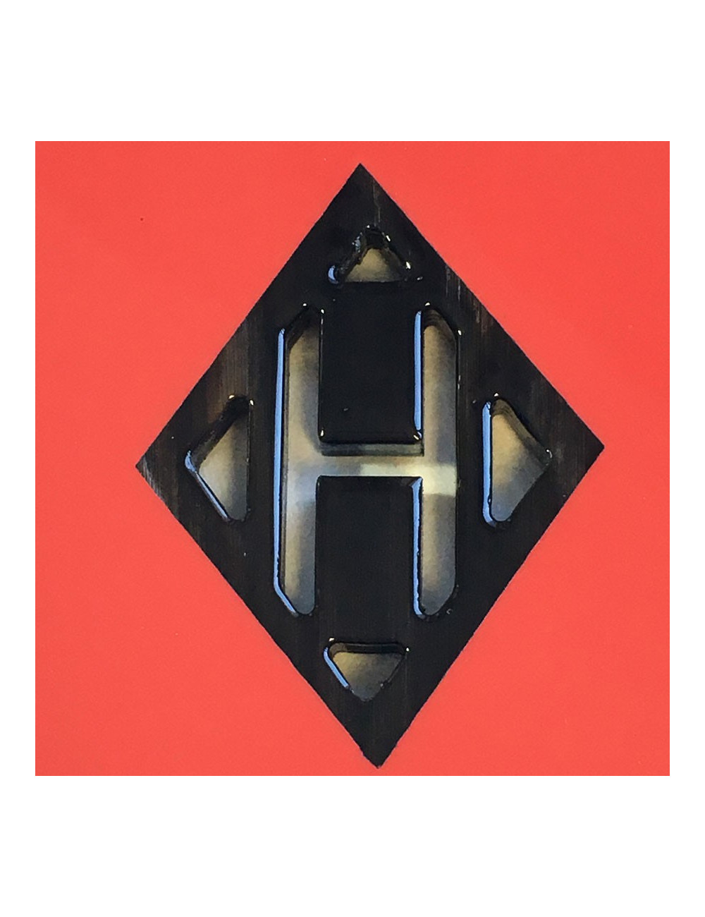 HERMES 'Kuartz' pendant in red lacquered wood and buffalo horn