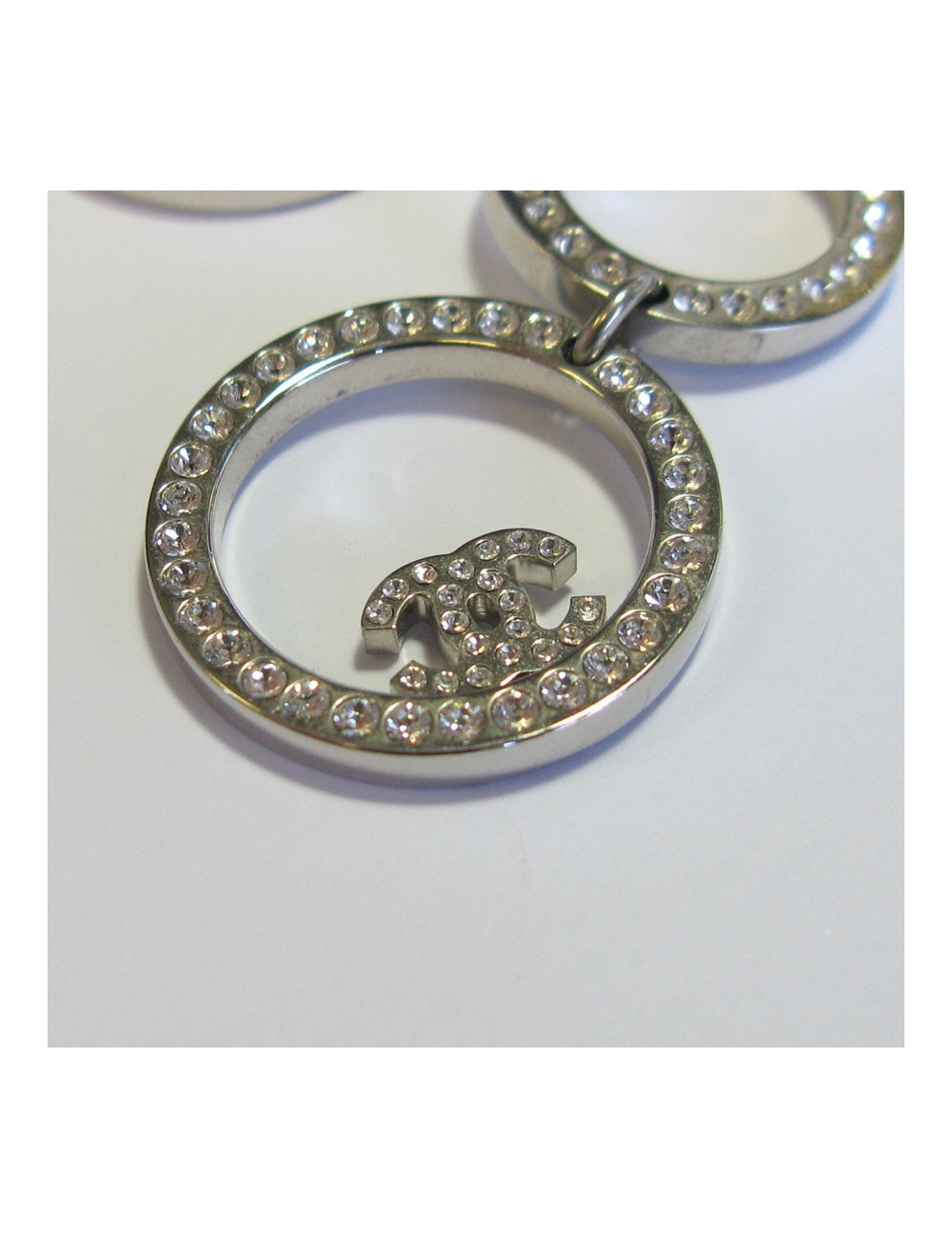 CHANEL dangling stud earrings in silver metal and white rhinestones