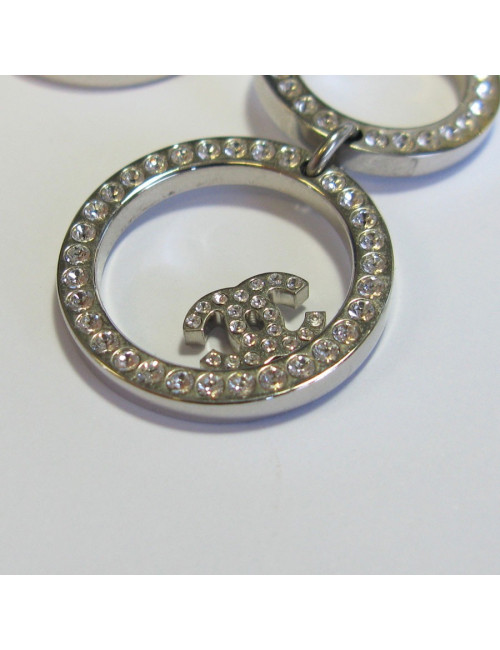 CHANEL dangling stud earrings in silver metal and white rhinestones