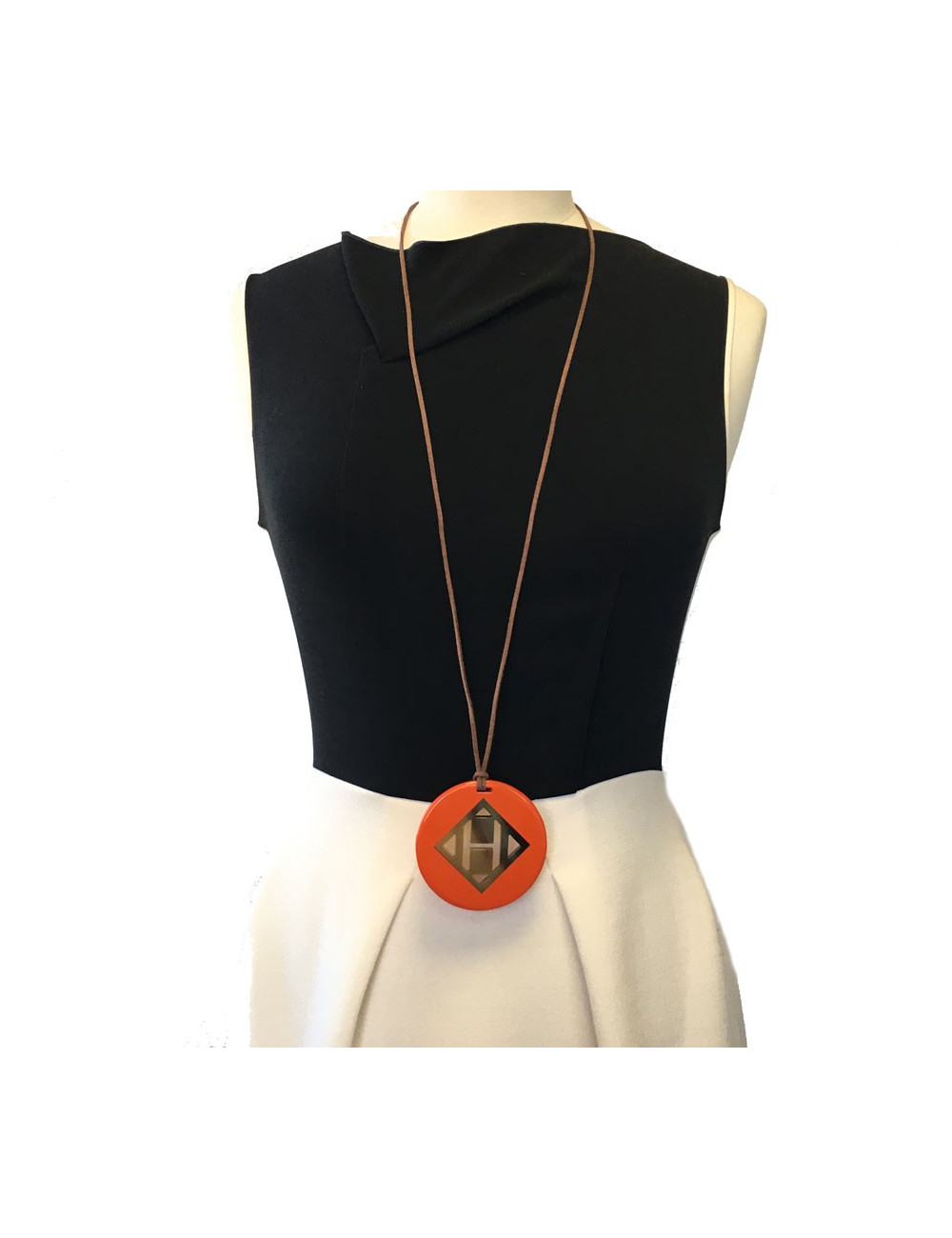 HERMÈS H round pendant in orange lacquered wood