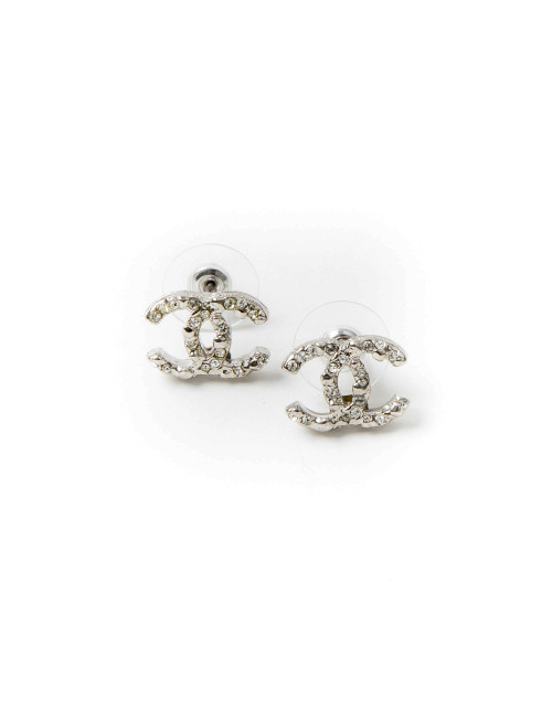 CHANEL CC stud earrings in silver metal and rhinestones