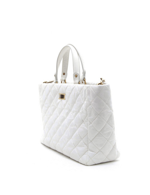 CHANEL tote bag in aged white patent leather