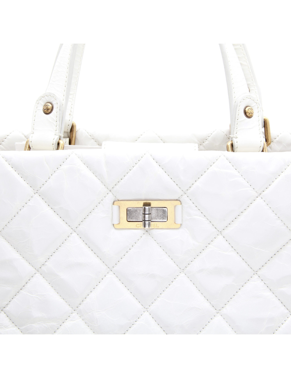 CHANEL tote bag in aged white patent leather