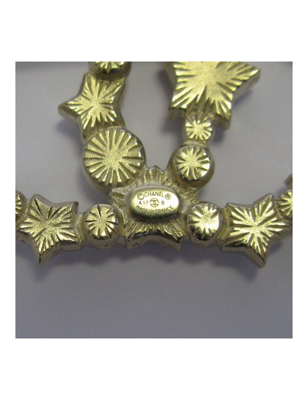 Broche Chanel dorée et nacrée