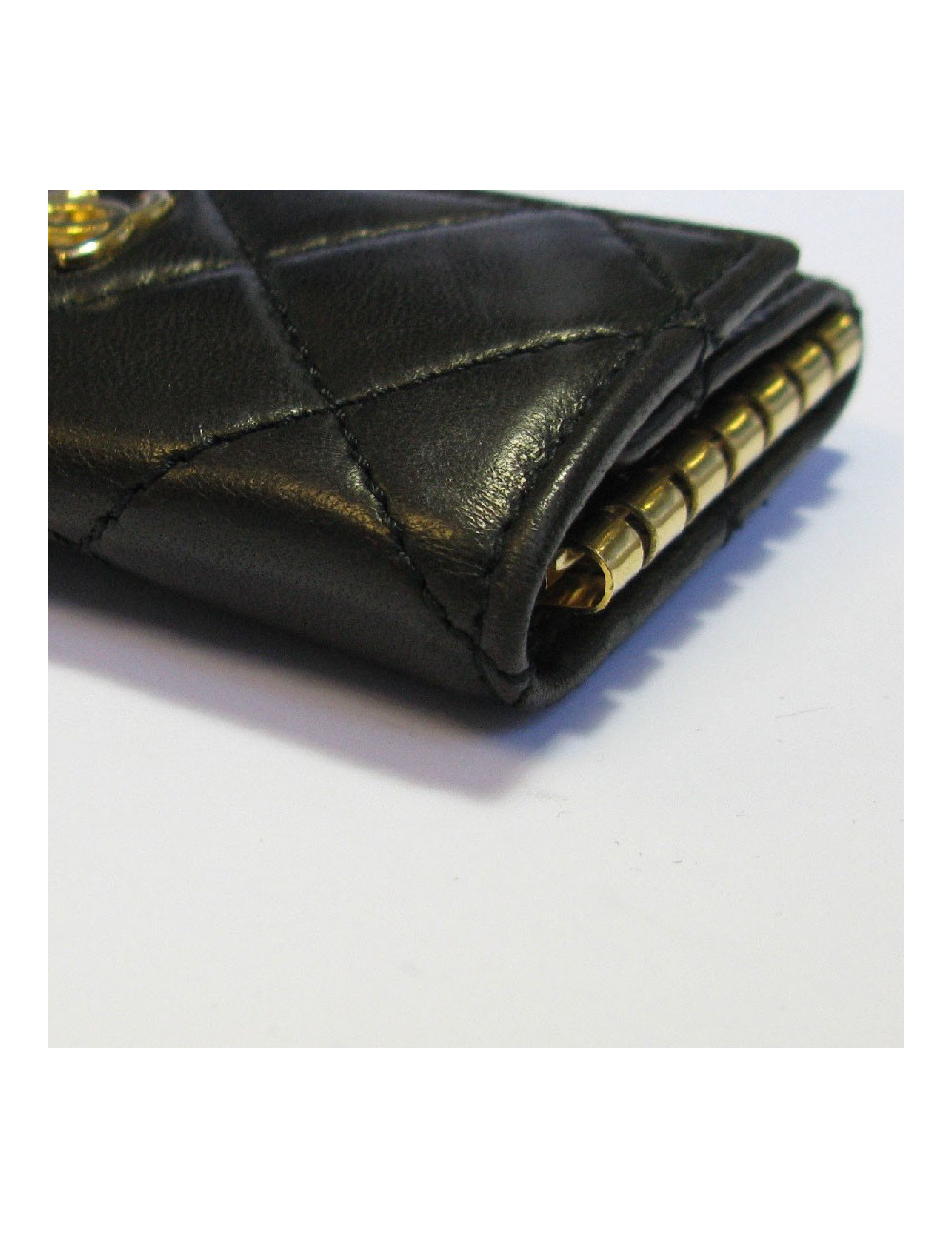 Porte clefs CHANEL cuir matelassé noir