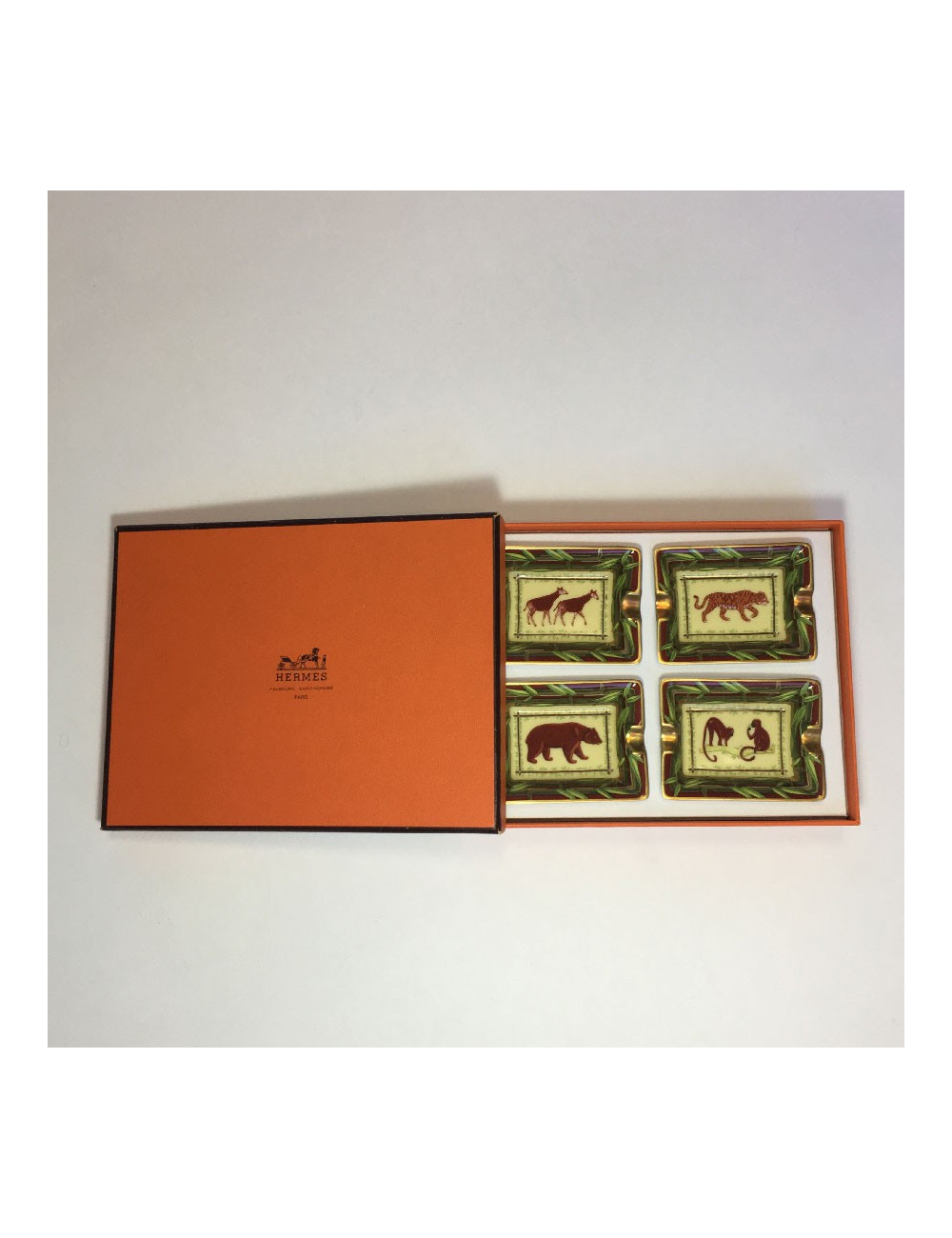 4 Mini cendriers HERMES en porcelaine motif animalier