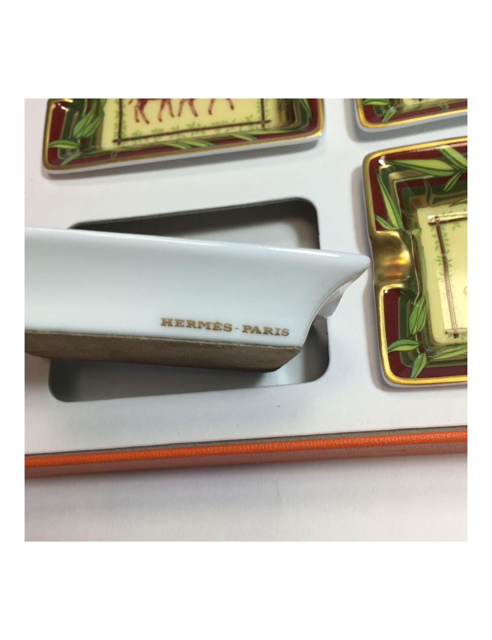 HERMES set of 4 mini ashtrays in white porcelain with animal pattern