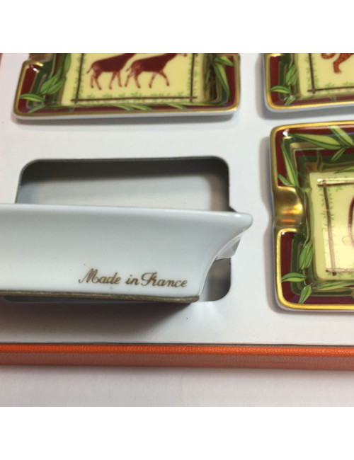HERMES set of 4 mini ashtrays in white porcelain with animal pattern